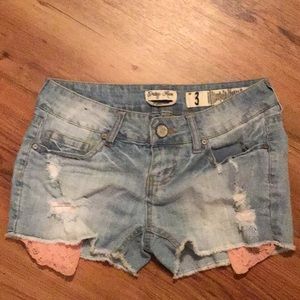 Ripped jean shorts